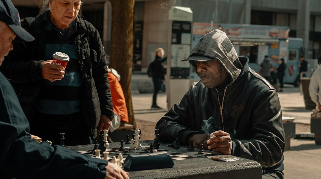 Production crew discussing around a table