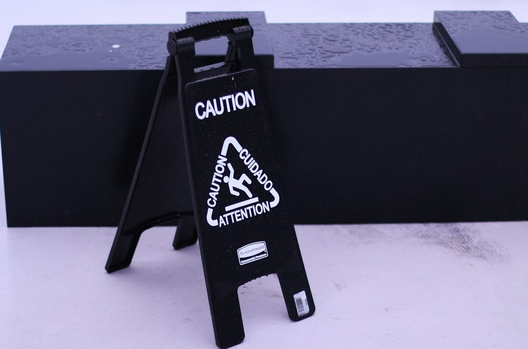 Film clapperboard on a dark surface