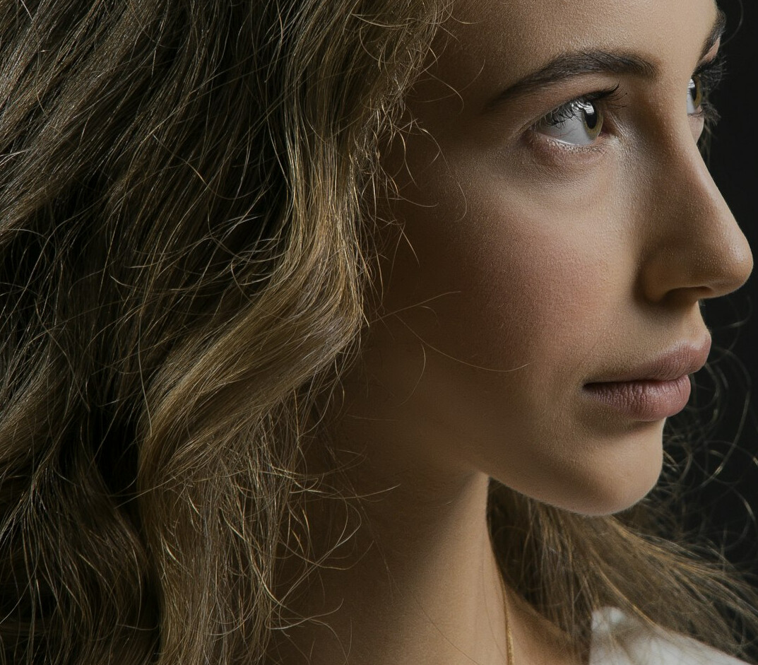 Portrait of a woman with light brown hair