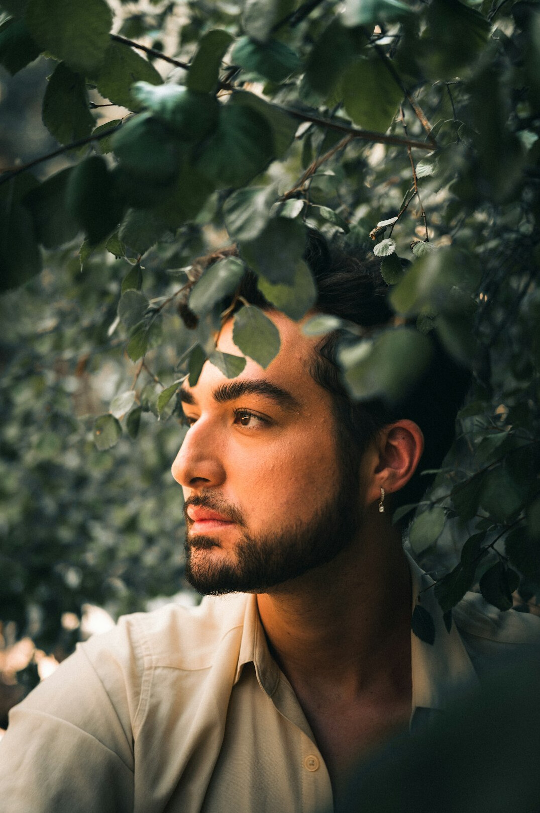 Portrait of a young man in a light shirt