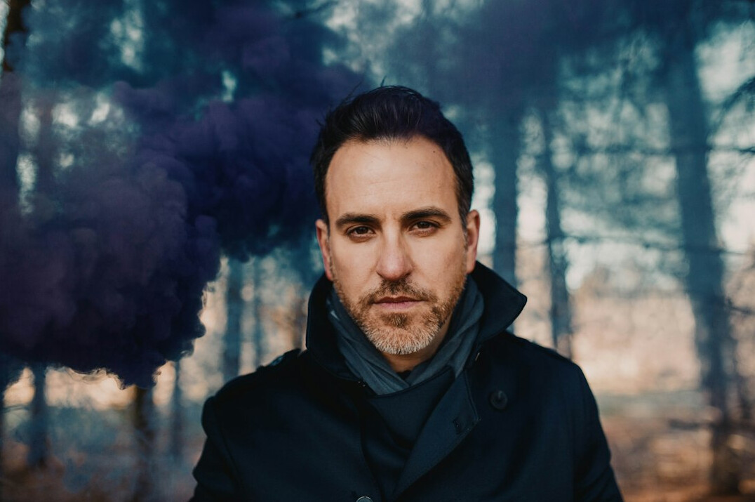 Portrait of a bearded man in a dark jacket